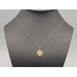 9ct gold st Christopher pendant and 9ct gold chain .2.6g