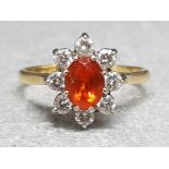 18ct yellow gold Fire Opal ring surrounded by 8 brilliant cut diamonds, size N, 4.1g