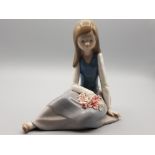 Lladro figure - seated girl with flowers on lap