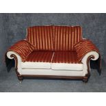 Cream 2 seater upholstered sofa with reversable cushions