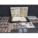 2 stamp albums loose stamps in presentation packets and wills cigarette cards etc