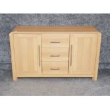 Modern light oak effect sideboard fitted with 3 drawers, 41x128cm, height 77.5cm