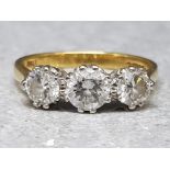 Boxed 18ct yellow gold 3 stone diamond ring comprising of .50ct centre diamond & 2x .33ct shoulder