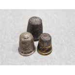 2 hallmarked silver thimbles and one steel and brass