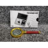 Brand new set of digital scales together with magnifying glass
