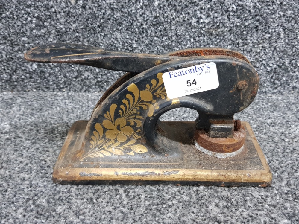 Very heavy black and gilt company stamper