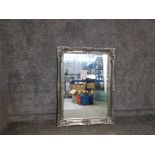 Heavy ornate framed mirror in silver 115cm x 85cm