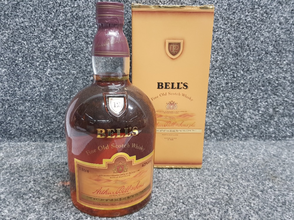 1 litre bottle of Bells fine old scotch whisky, Perth Scotland, still sealed with original box
