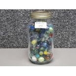 Vintage marbles of various sizes in a kilner jar