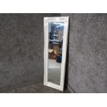 A modern rectangular wall mirror in white swept frame 107 x 44cm