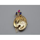 Ladies 18ct yellow gold diamond brooch with clock featuring 2 blue sapphires and 1 ruby set in the