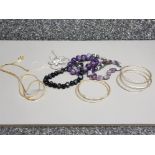 Two silver gilt bangles, silver chain, gold plated chain, two amethyst bracelets etc