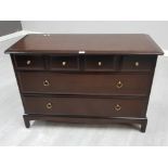 A stag chest of six drawers 107 x 71 x 46.5cm