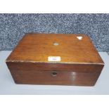 A georgian mahogany box with sewing contents