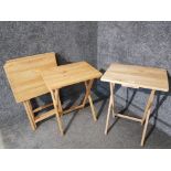 Five folding wooden tables