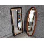 Two wall mirrors, one oblong and the other rectangular with bevelled glass