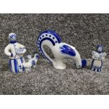 Three Russian porcelain figures of a large cockerel a lady feeding chickens and small lady with