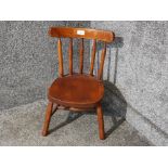 A child's elm seated chair