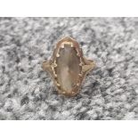 Ladies 9ct yellow gold oval smokey quartz ring set in a claw setting size q 3.1g gross