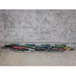 Box of approximately 15 models of trains of yesteryear on custom stands