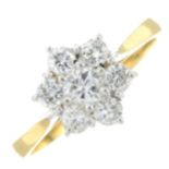 An 18ct gold diamond cluster ring.Estimated total diamond weight 0.55ct,