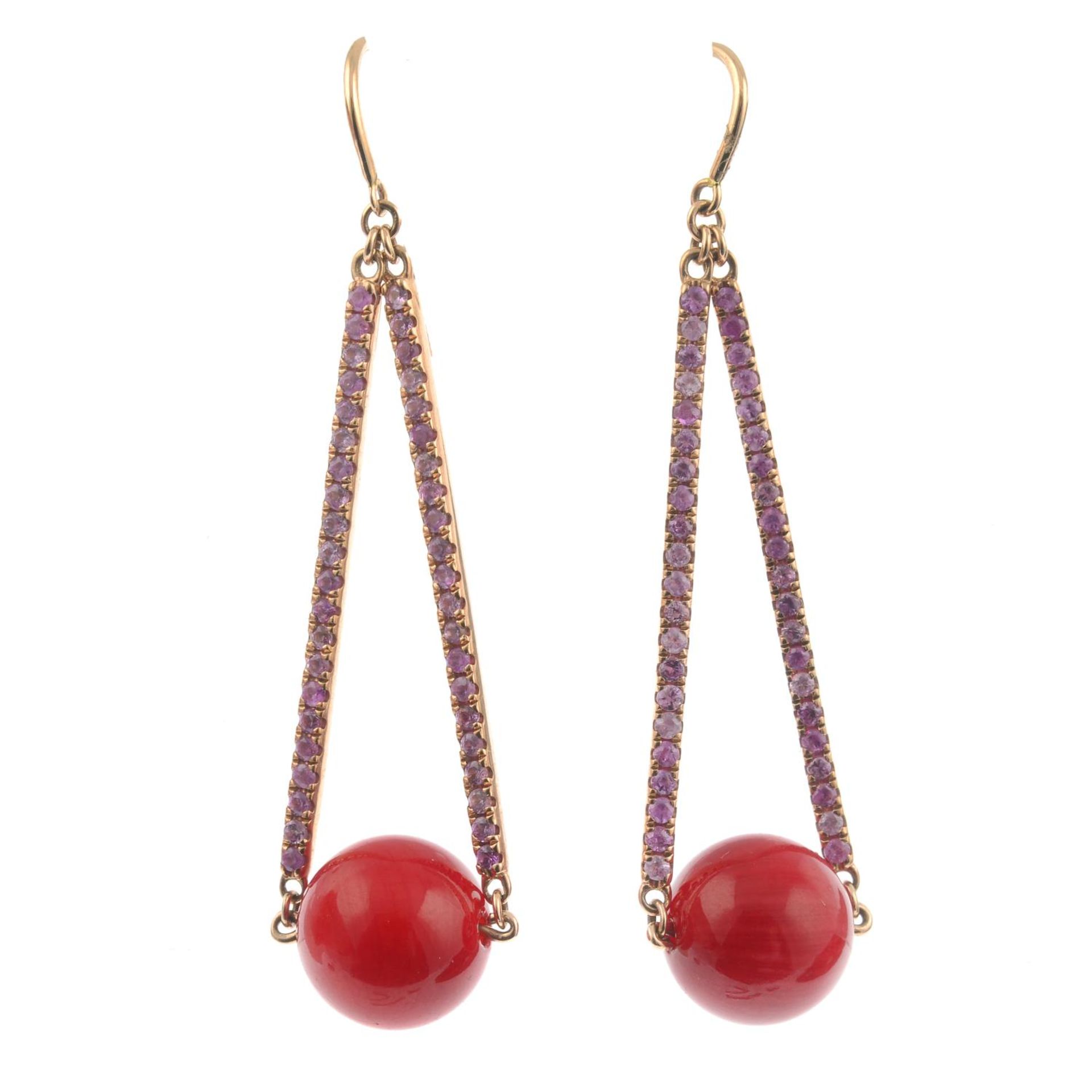 A pair of pink sapphire and coral drop earrings.Total pink sapphire weight 0.67ct,