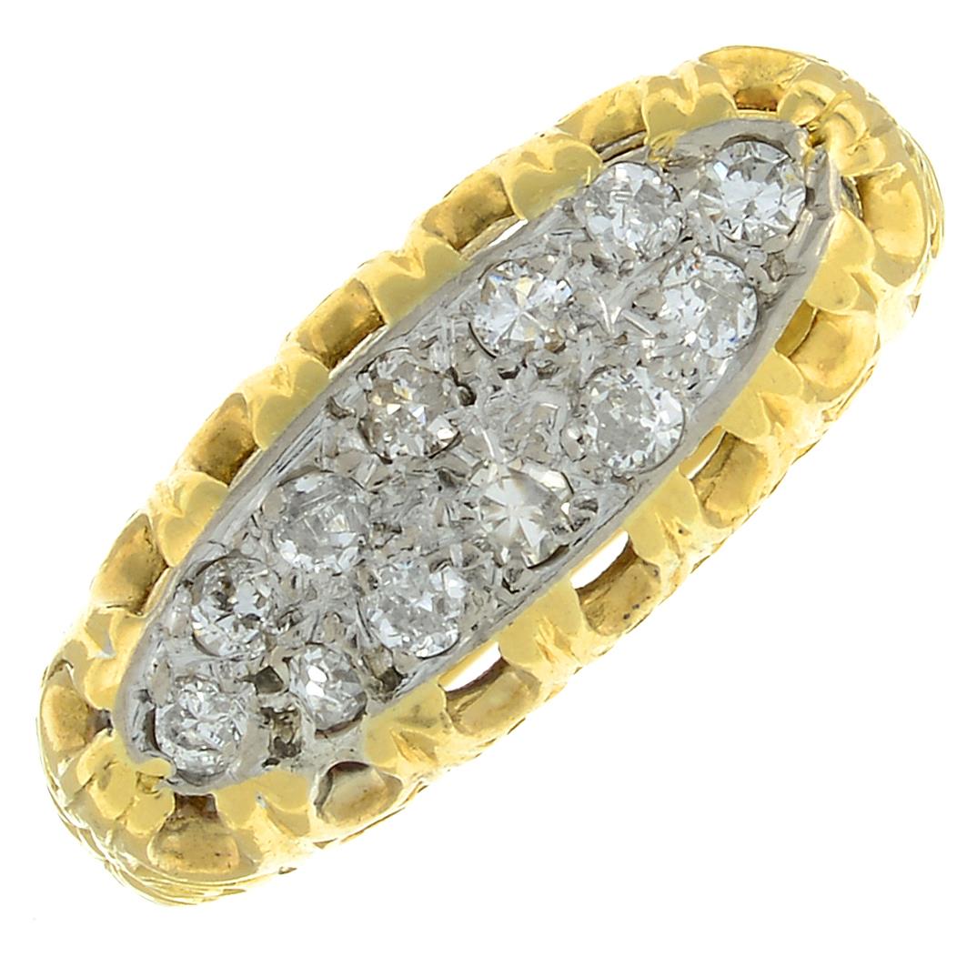 An 18ct gold diamond ring.Estimated total diamond weight 0.20ct.Hallmarks for London,