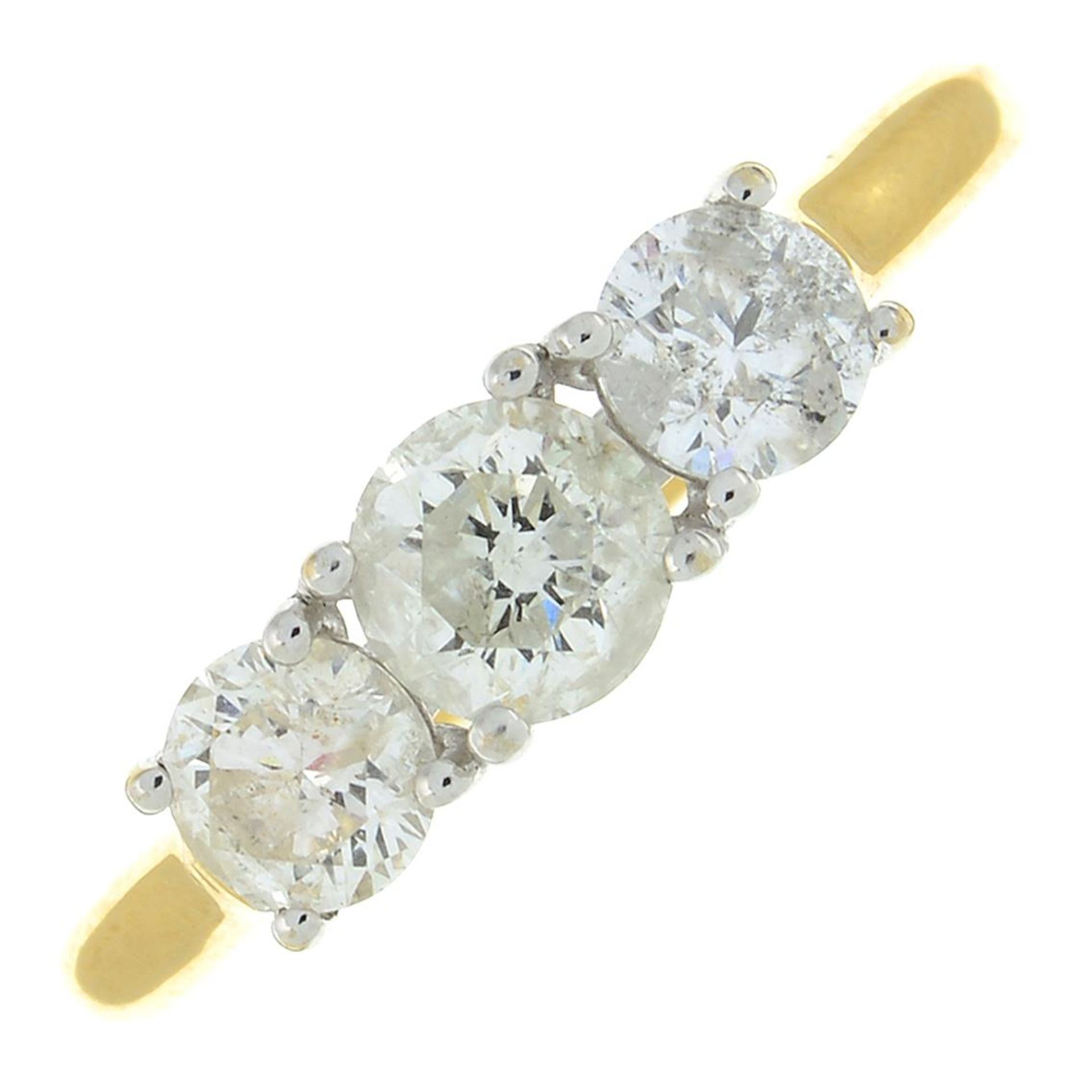 An 18ct gold diamond three-stone ring.Total diamond weight 1ct,