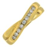 An 18ct gold diamond crossover band ring.Estimated total diamond weight 0.35ct.