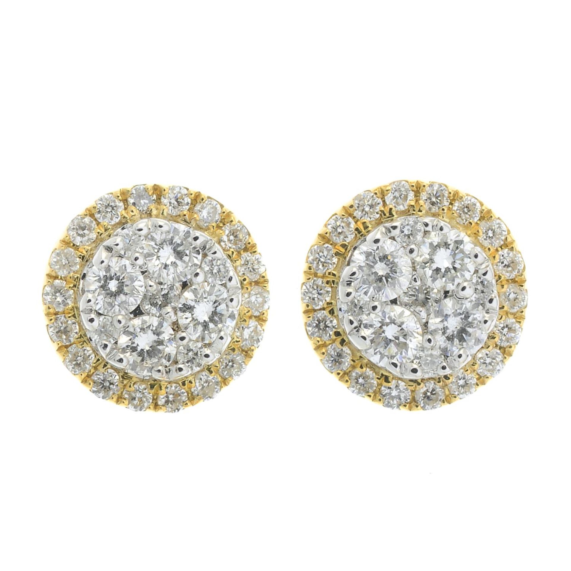 A pair of 18ct gold diamond earrings.Total diamond weight 0.43ct.