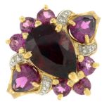 A red and purple garnet and diamond ring.Stamped 375.Ring size N.