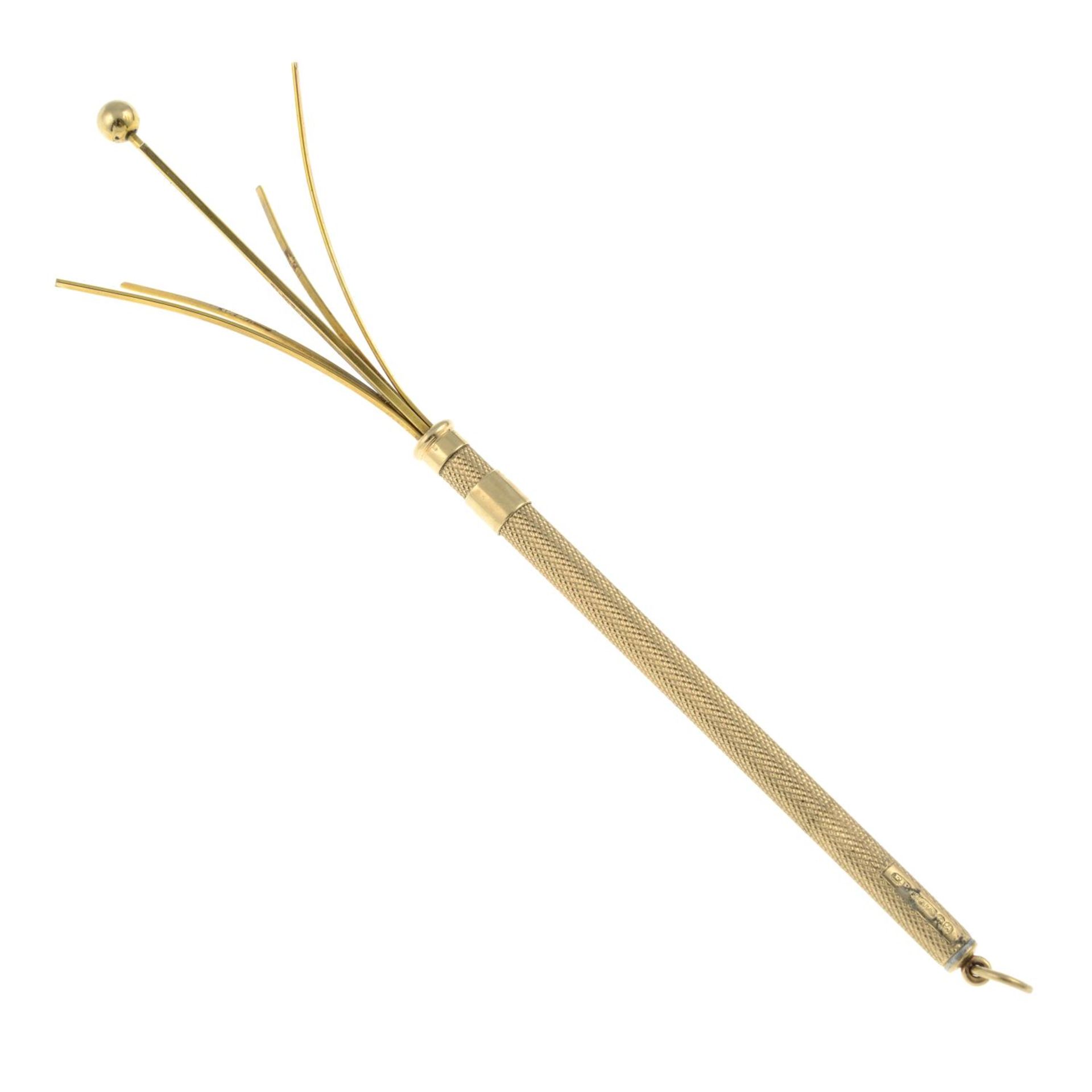 A mid 20th century 9ct gold cocktail stirrer.Hallmarks for Birmingham, 1950.Full length 13.5cms.