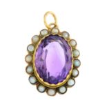 An early 20th century gold amethyst and split pearl cluster pendant.Length 3.6cms.