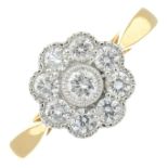 An 18ct gold diamond floral cluster ring.Total diamond weight 0.54ct.Hallmarks for 18ct gold.