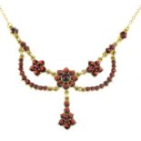 A garnet garland necklace.Stamped 375.Length 42cms.