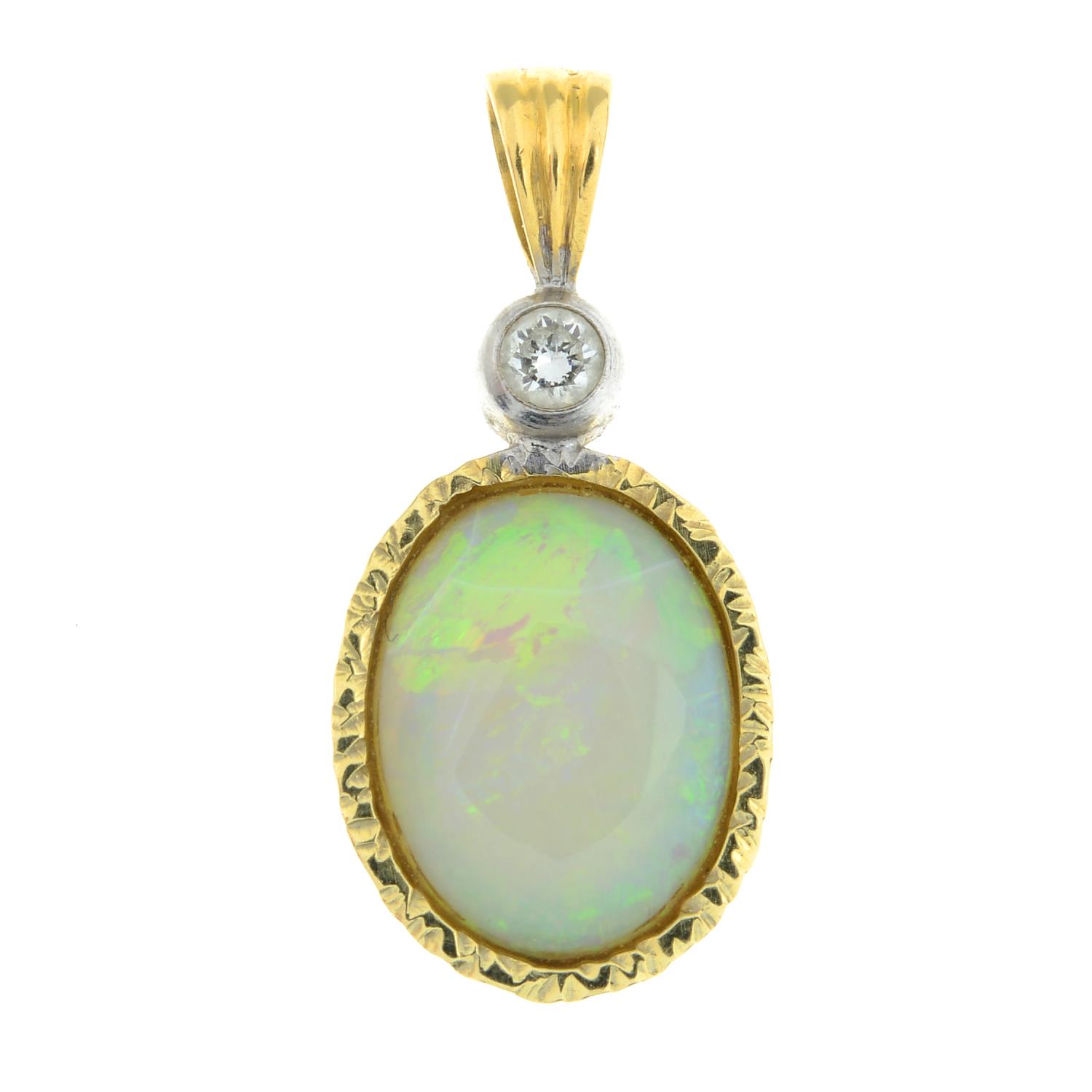 An opal and diamond pendant.Stamped 18K.