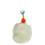 A white jade and orange gem pendant, with chain.