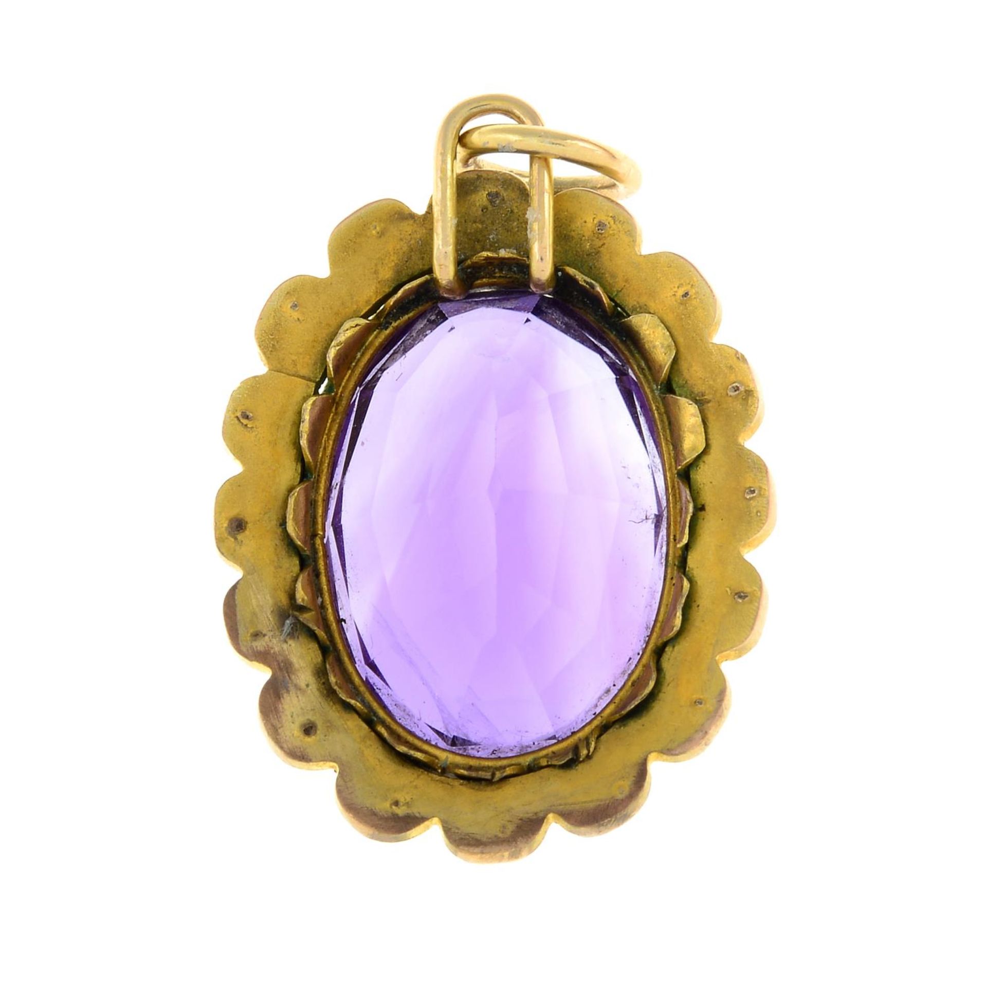 An early 20th century gold amethyst and split pearl cluster pendant.Length 3.6cms. - Image 2 of 2