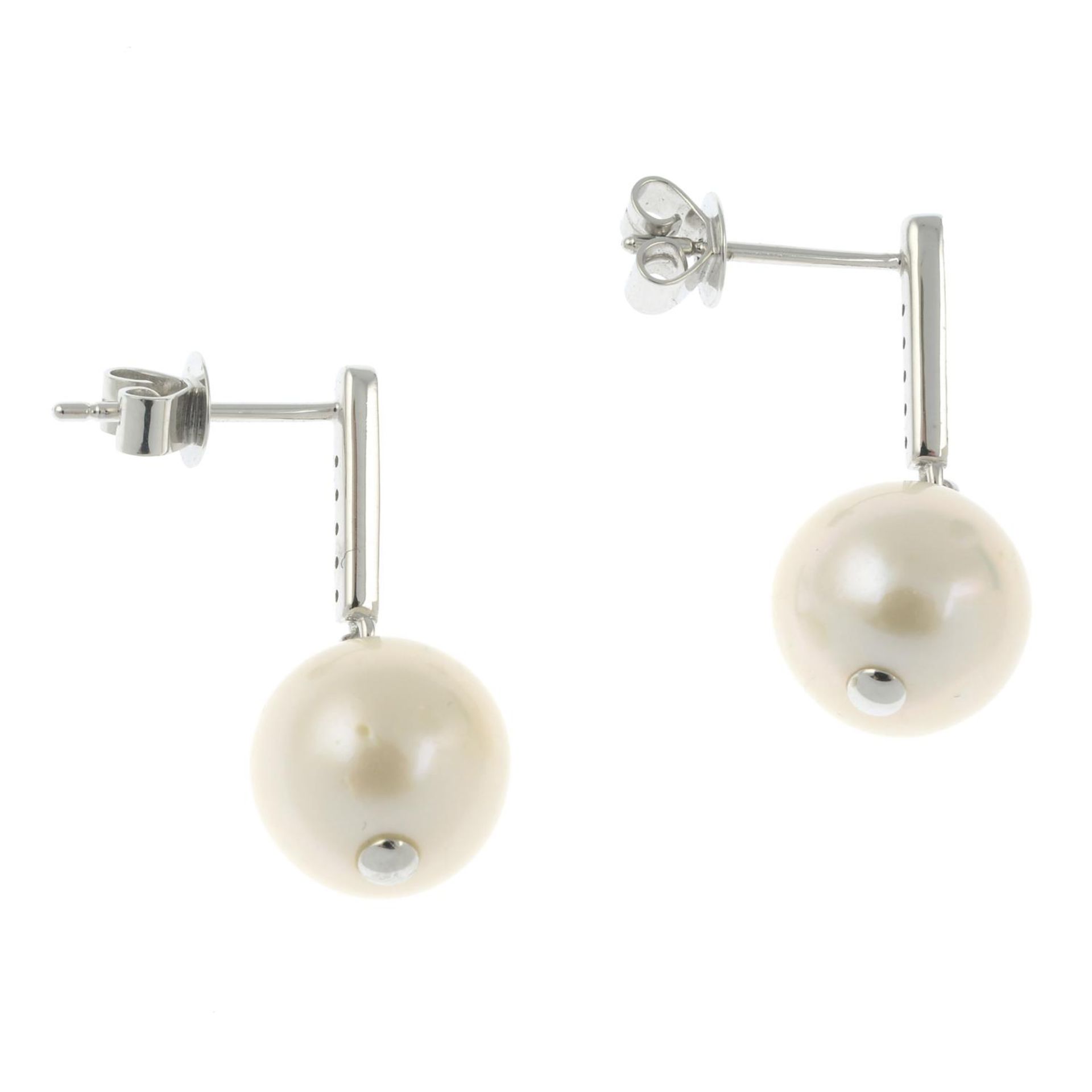 A pair of cultured pearl and diamond drop earrings.Cultured pearls measuring 9.8 and 9.7mms. - Image 2 of 2