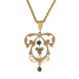 An early 20th century 9ct gold turquoise and spilt pearl pendant,