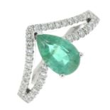 An emerald and diamond dress ring.Emerald weight 0.80ct,