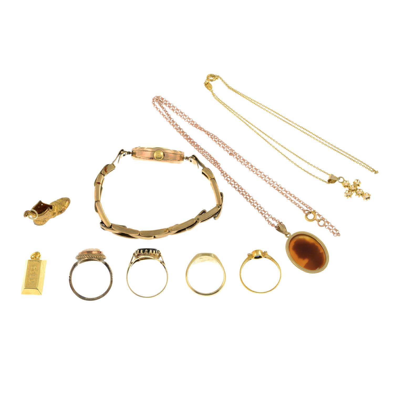 A selection of jewellery, to include four rings, a watch, two charms and two necklaces. - Image 4 of 4