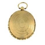 An oval locket, with engine-turned motif.Length 6.5cms.