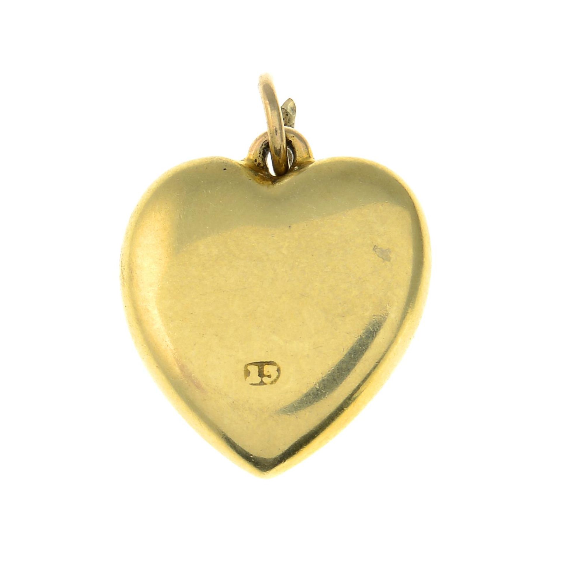 An early 20th century split pearl heart pendant.Stamped 15. - Image 2 of 2