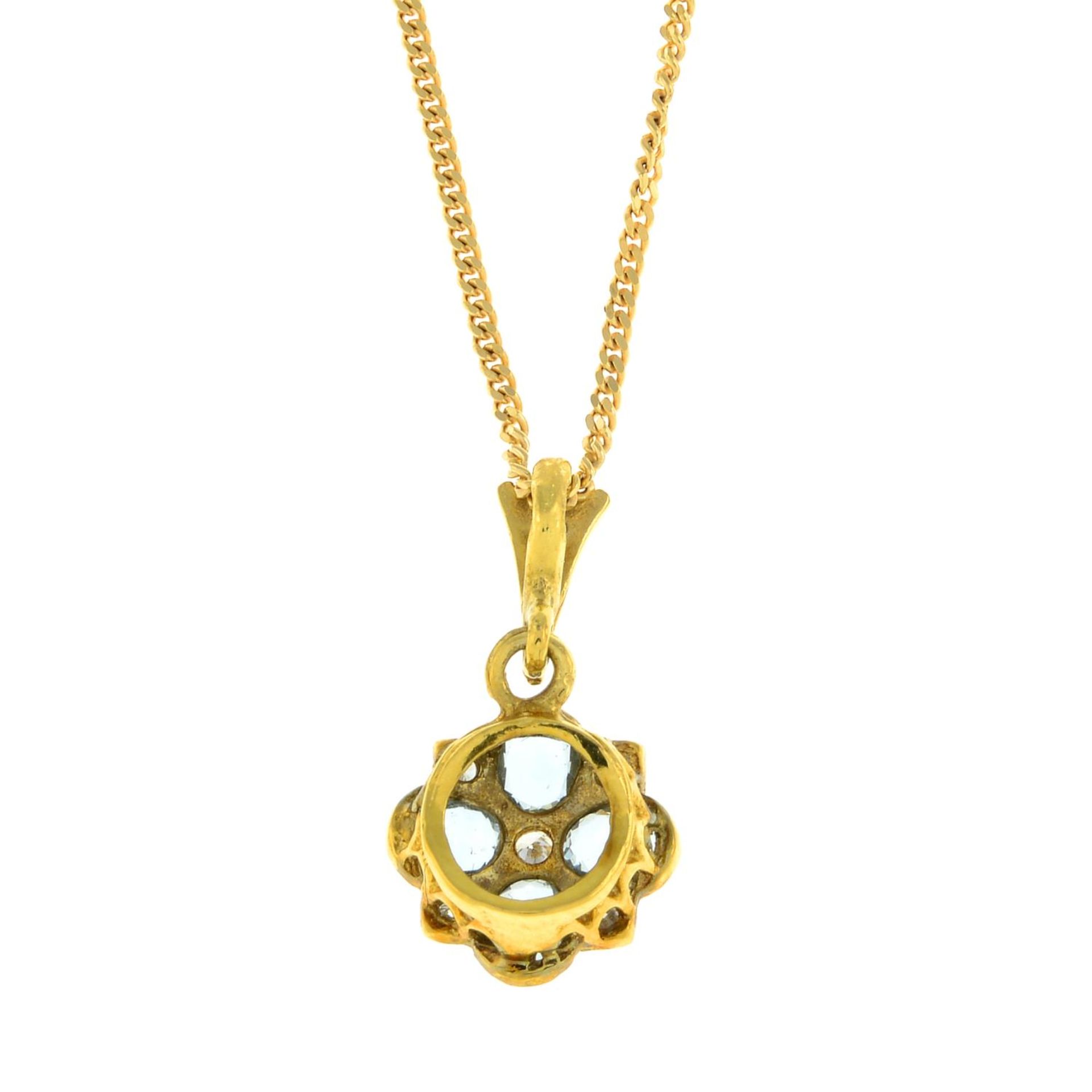 A 9ct gold aquamarine and diamond floral pendant, with 9ct gold chain.Hallmarks for 9ct gold. - Image 2 of 3