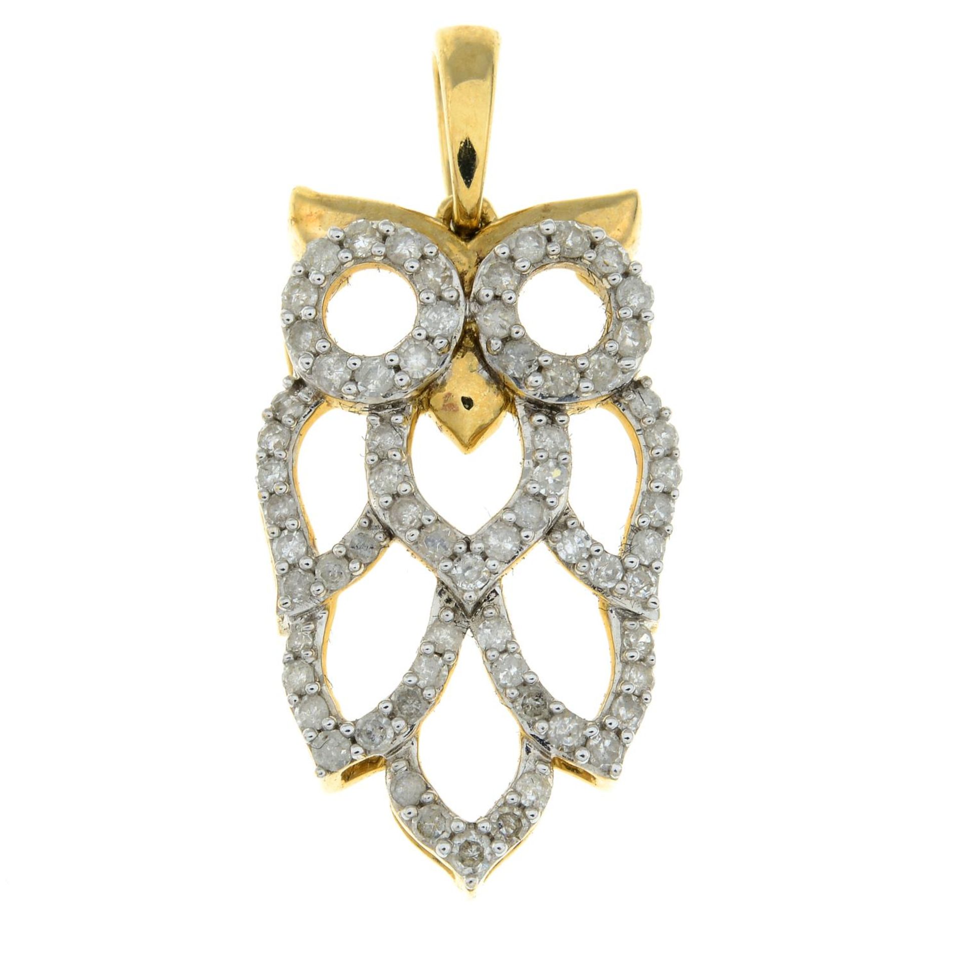 A 9ct gold diamond owl pendant.Estimated total diamond weight 0.60ct.