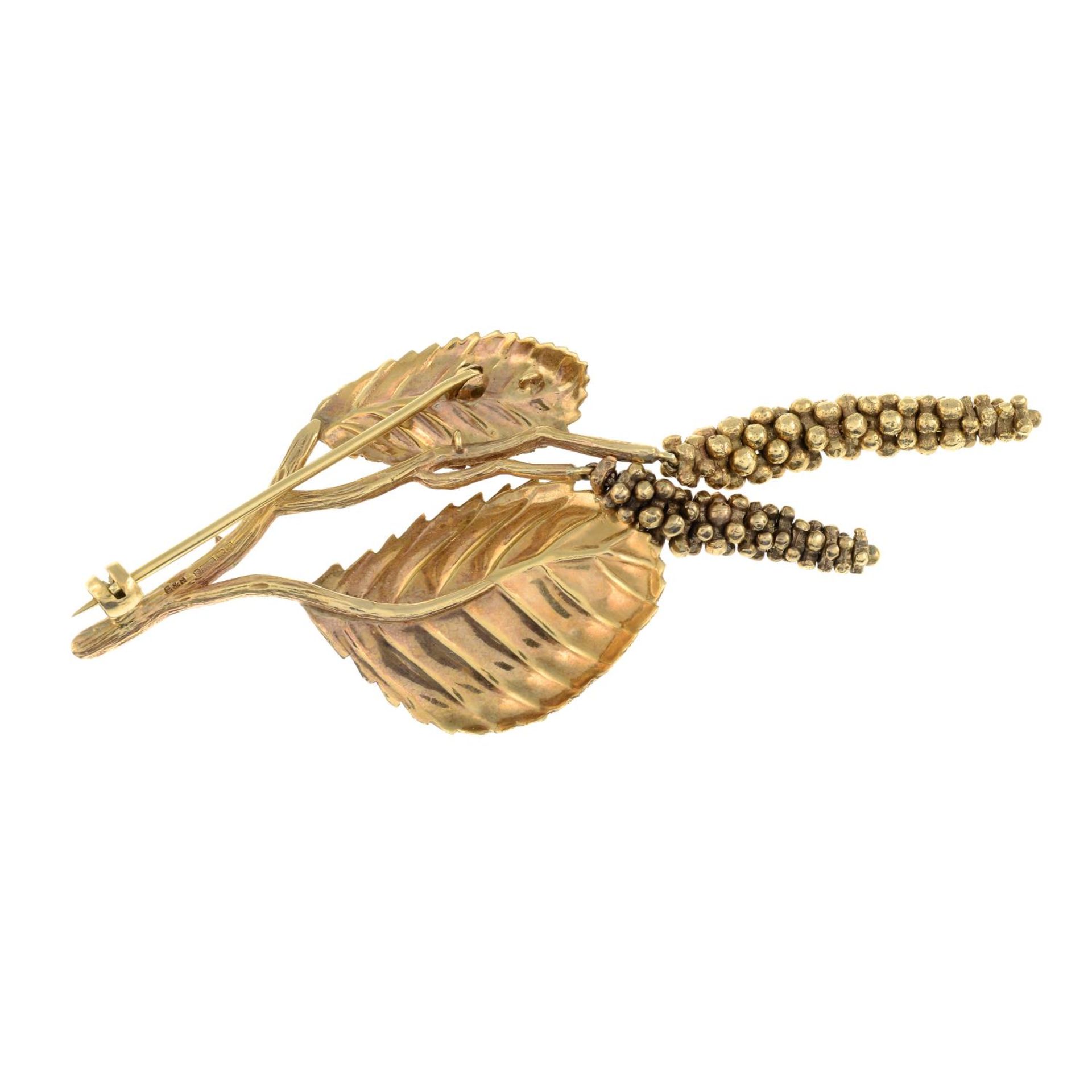 A 9ct gold brooch, designed to depict textured leaves and catkins.Hallmarks for 9ct gold. - Image 2 of 2