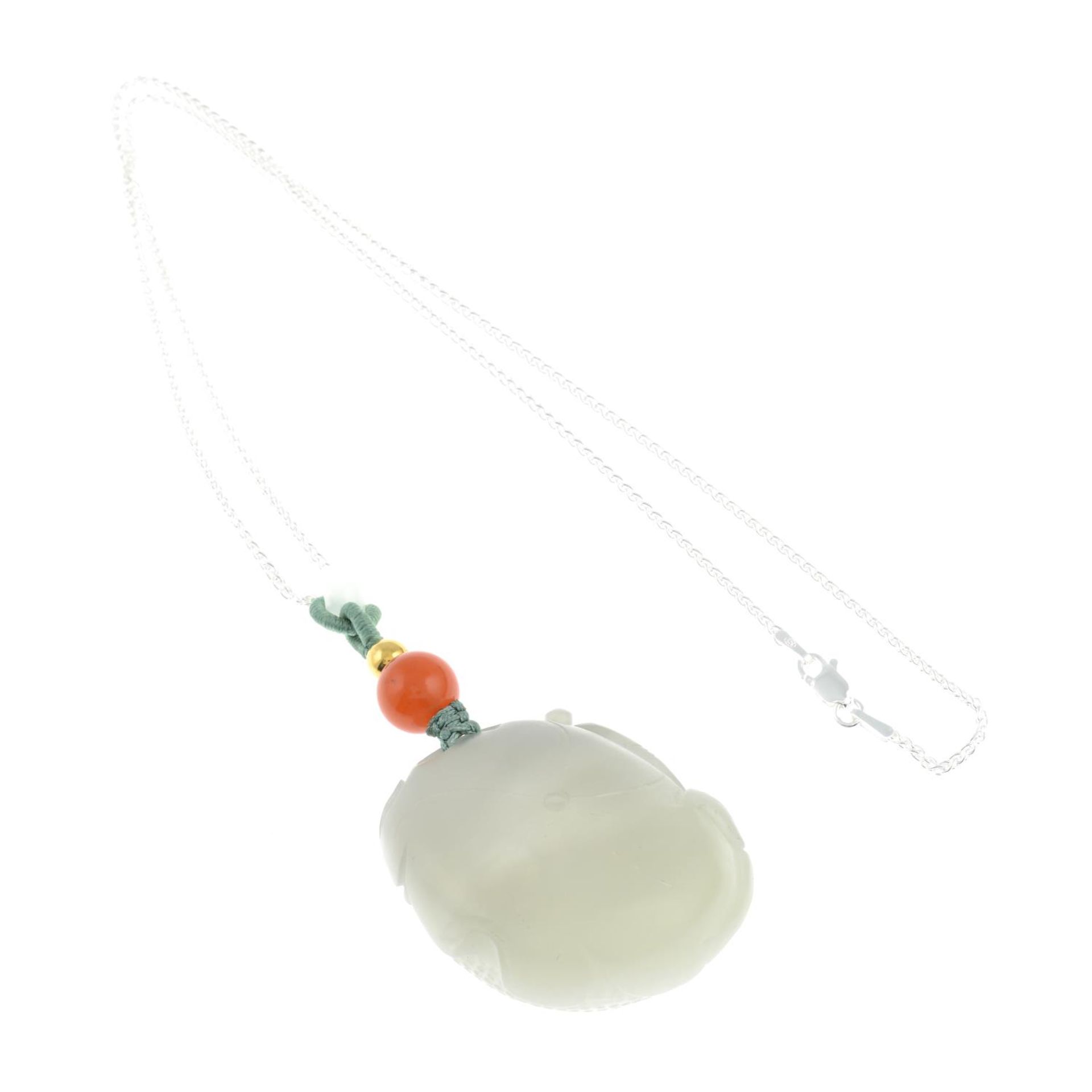 A white jade and orange gem pendant, with chain. - Image 2 of 2