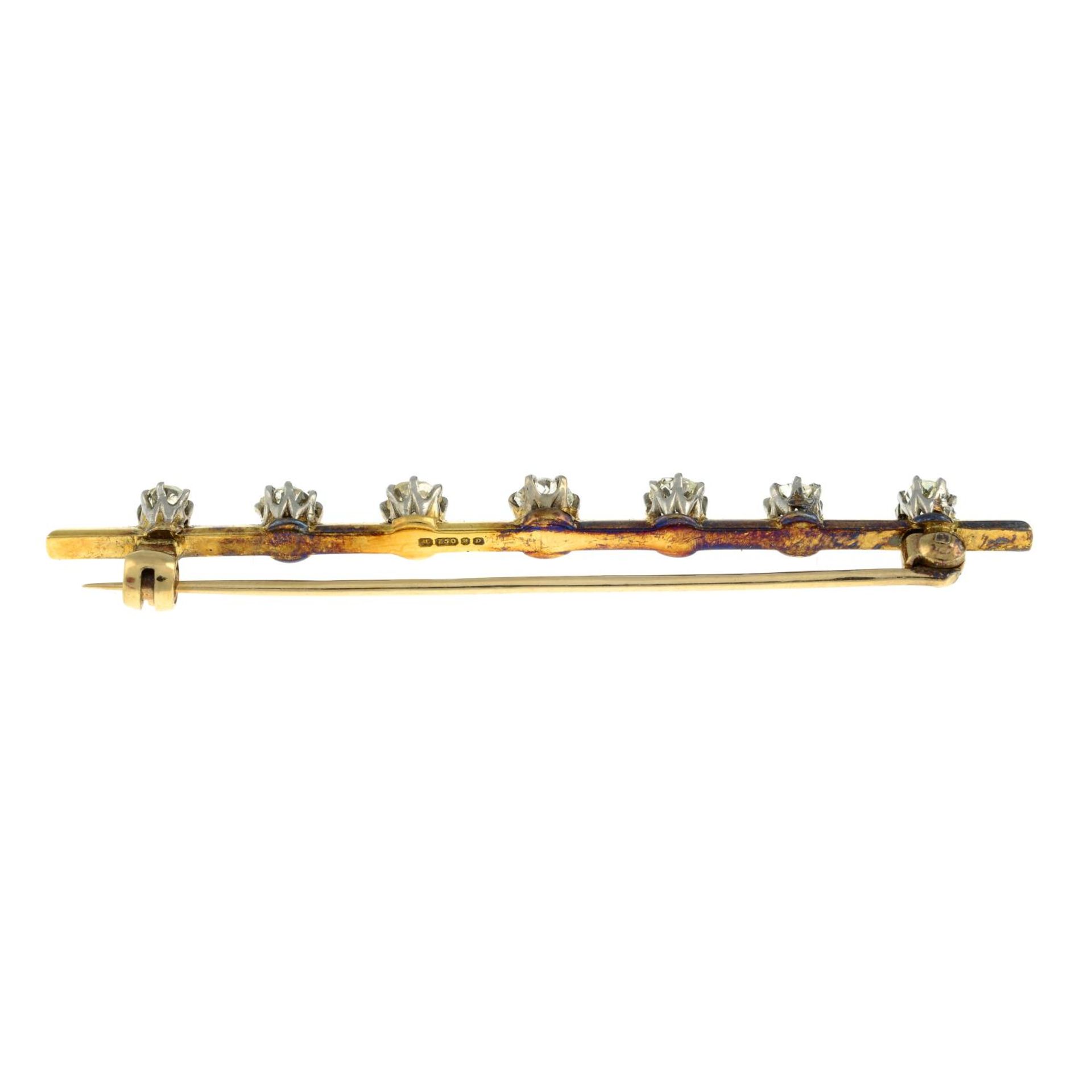 An 18ct gold diamond bar brooch.Estimated total diamond weight 1.20cts, - Image 2 of 3