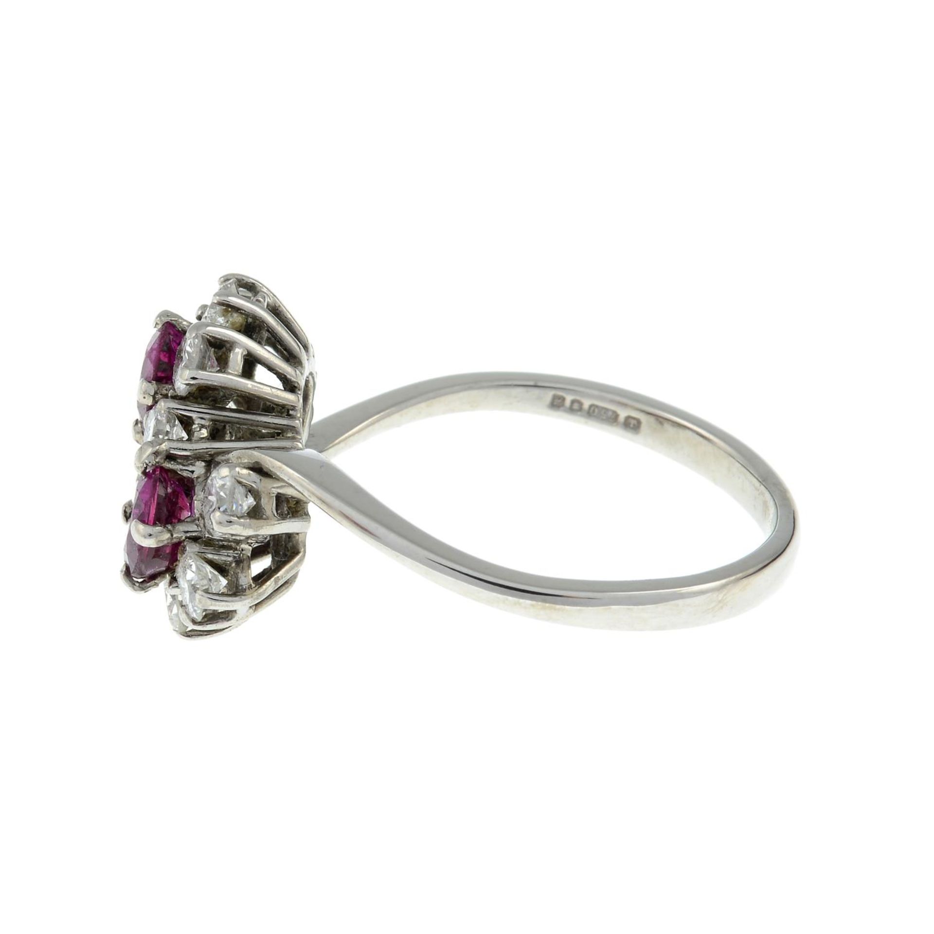 An 18ct gold ruby and diamond dress ring.Estimated total diamond weight 0.50ct. - Image 3 of 3